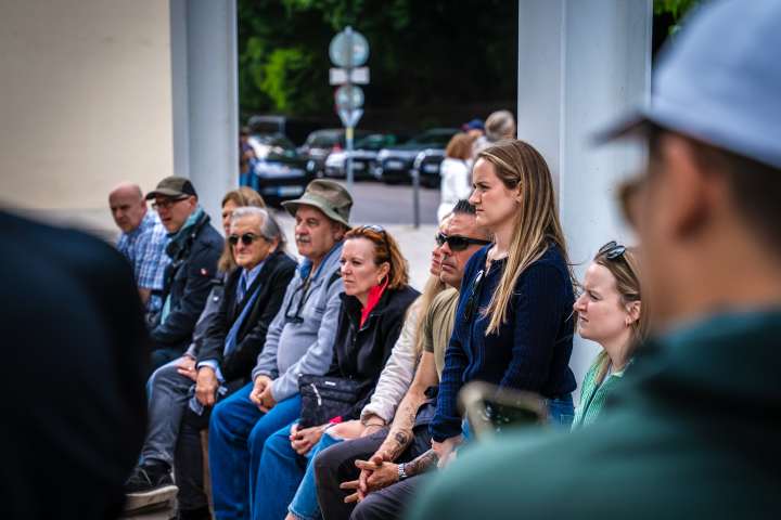 a group of people that are talking to each other