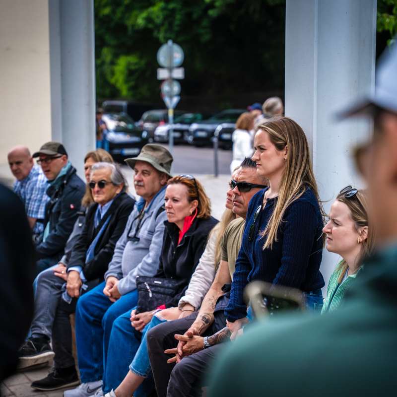 a group of people that are talking to each other