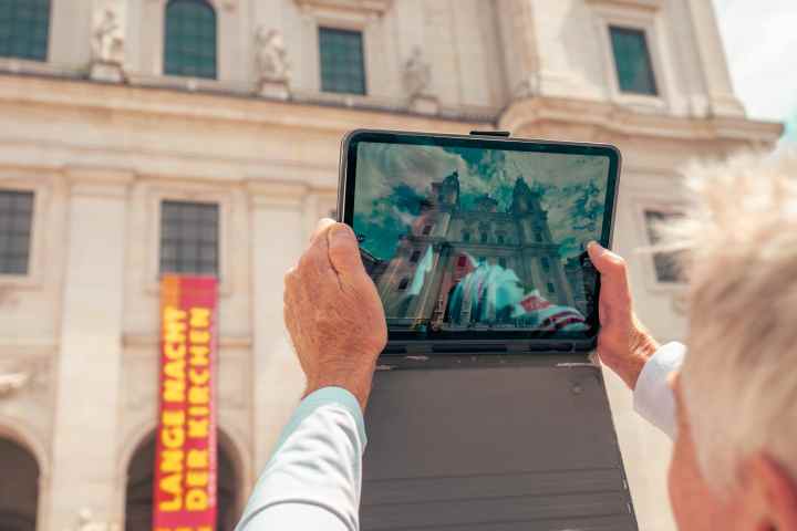 a man standing in front of a building