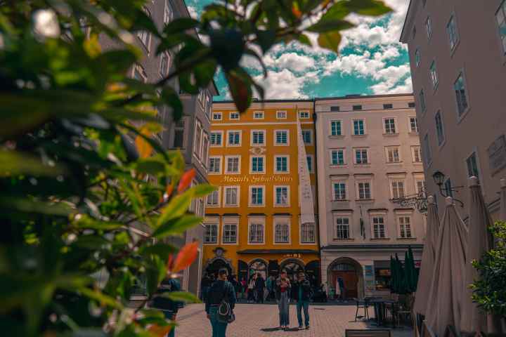 a group of people standing in front of a building