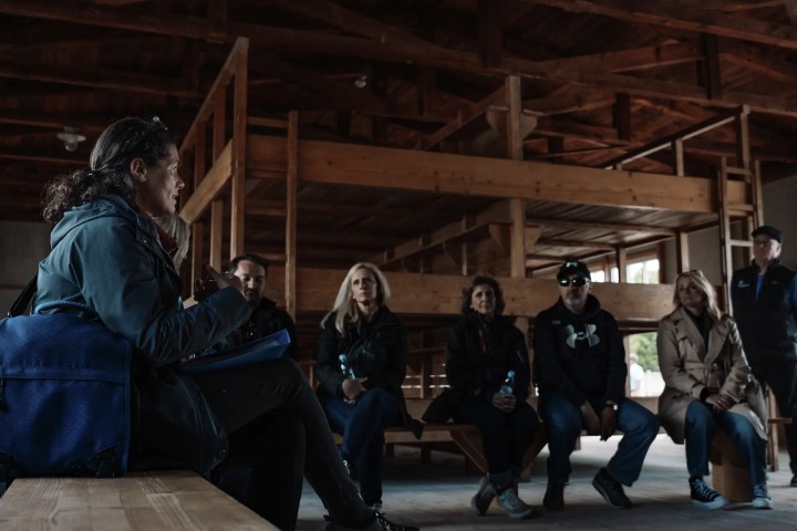 a group of people standing in front of a building