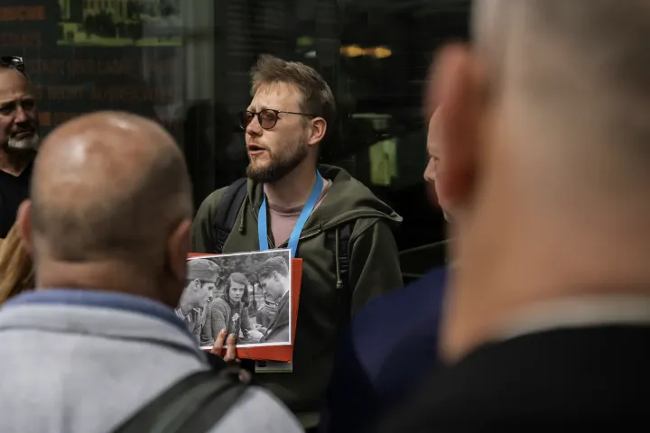 a group of people looking at the camera