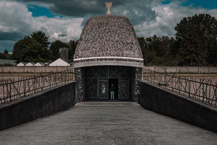 a stone bridge over a fence