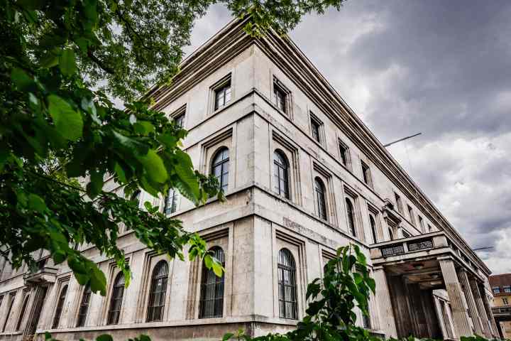 a large stone building with a clock tower