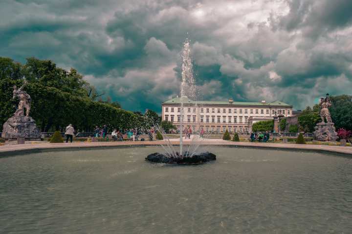 a body of water with a city in the background