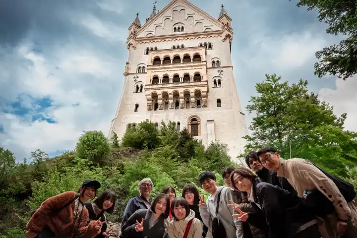 a group of people standing in front of a building
