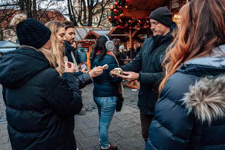 a group of people standing in front of a crowd