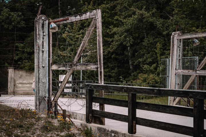 a bridge going over a wooden fence