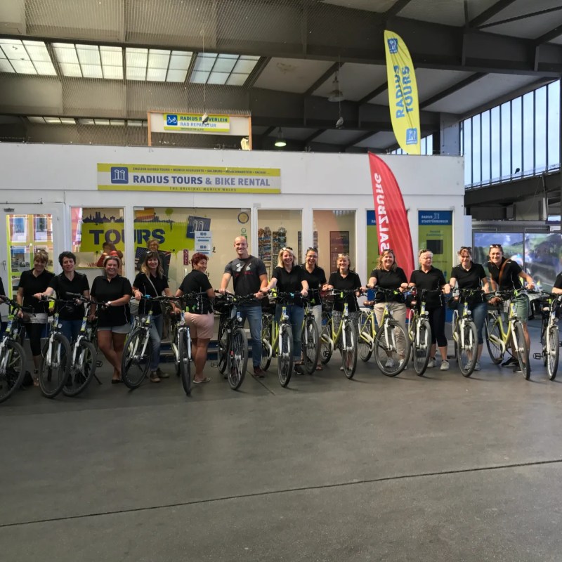 a group of people standing in front of a building